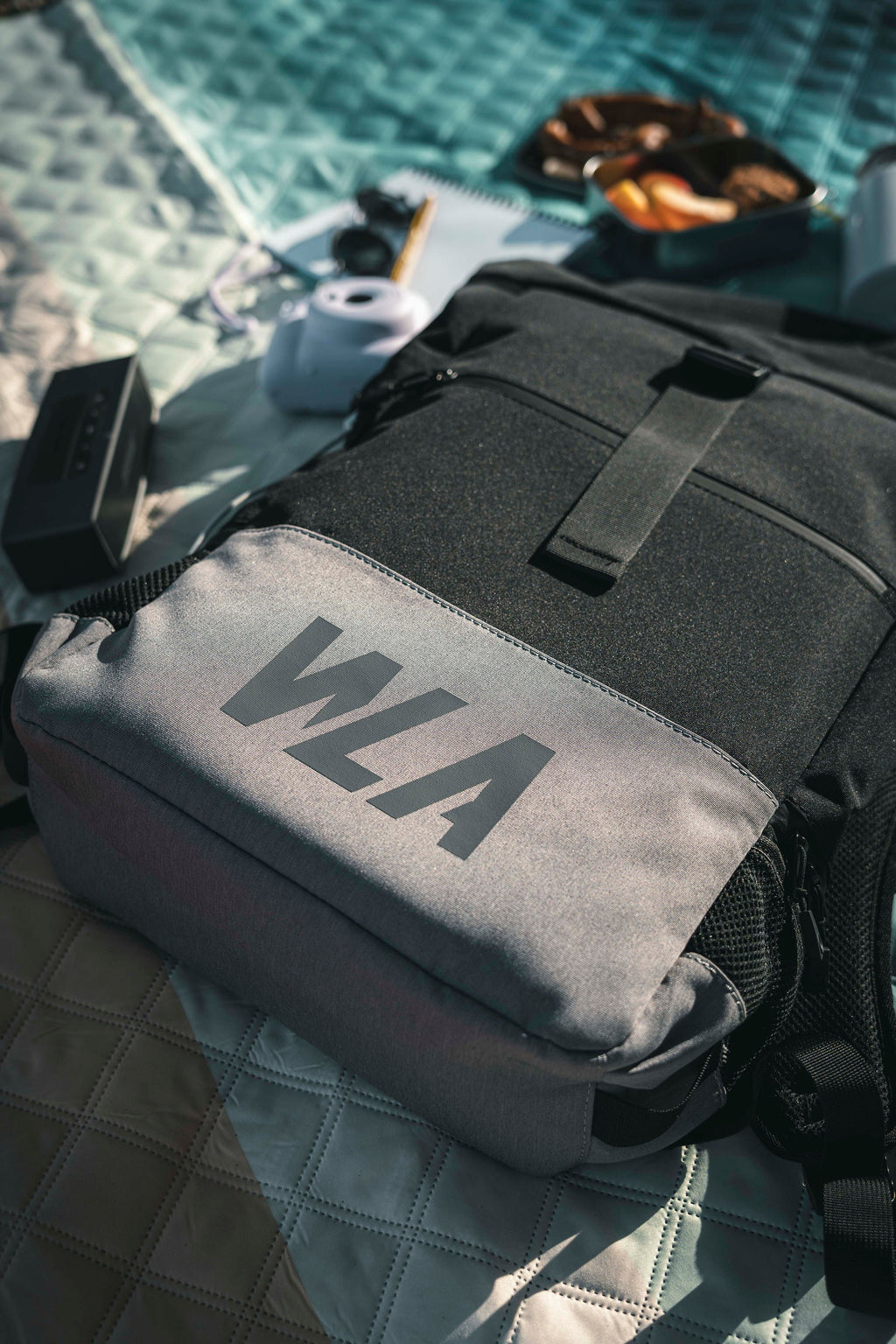 Large roll-top backpack with chest strap and wet compartment, water-repellent, black-grey