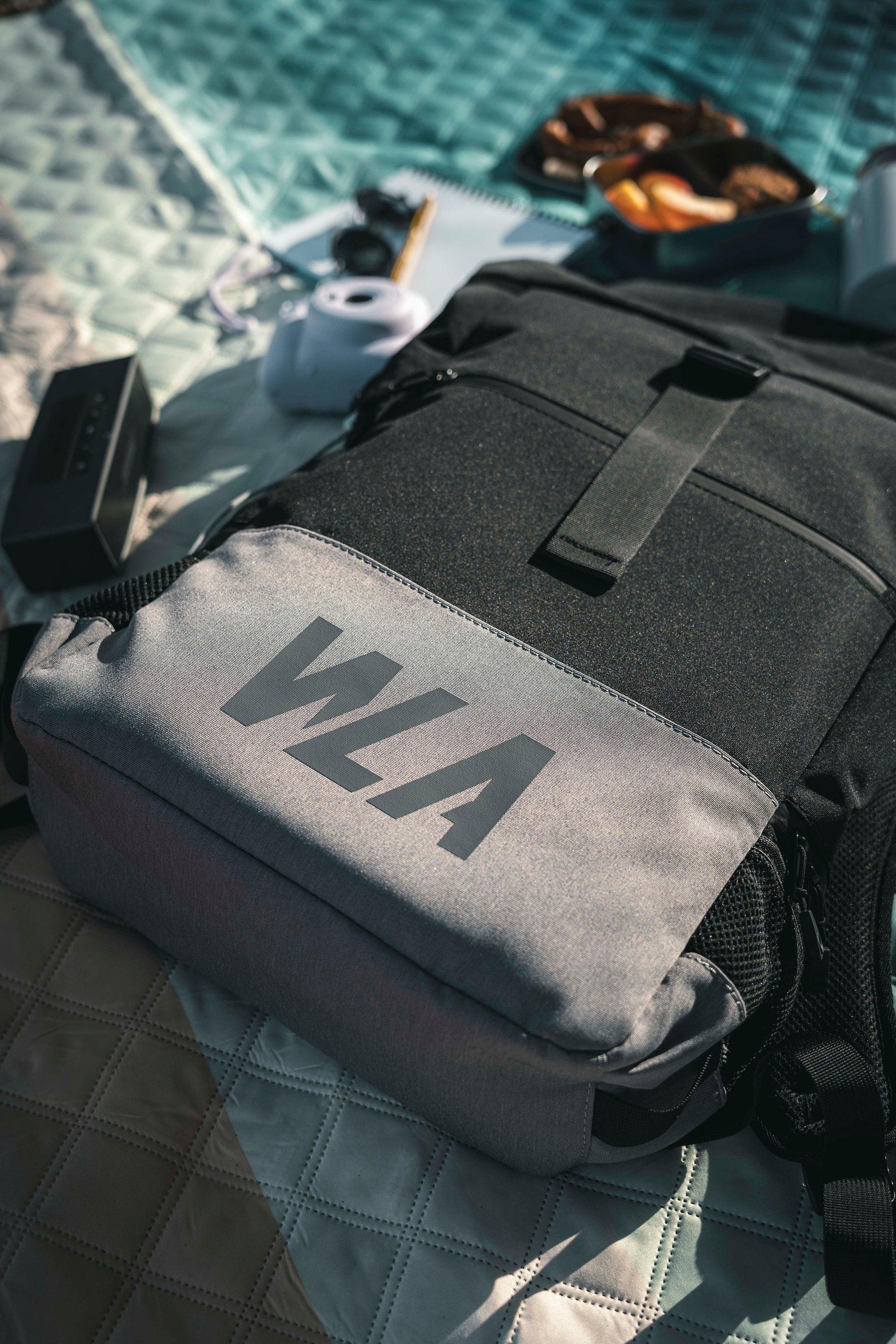 Large roll-top backpack with chest strap and wet compartment, water-repellent, black-grey